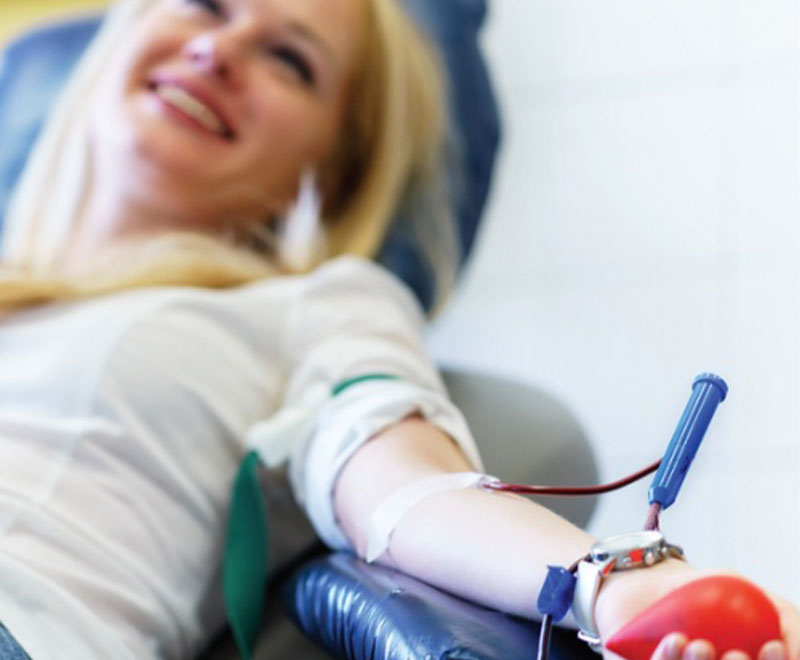 Woman in a chair giving blood
