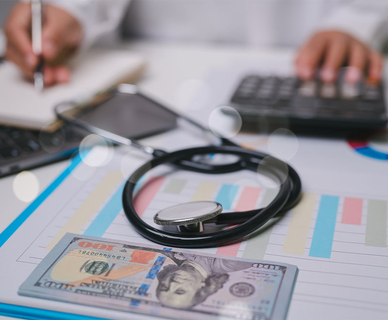 Image of person calculating hospital costs