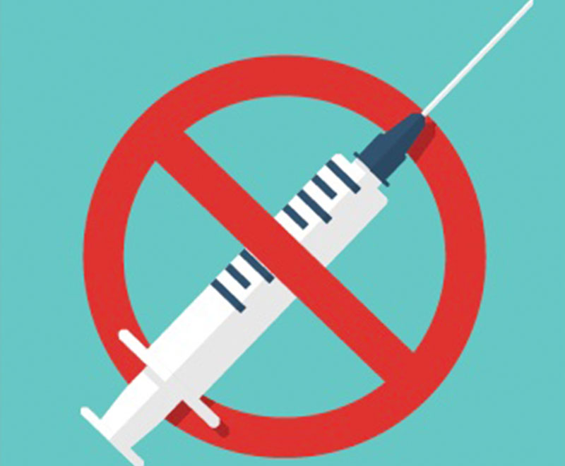 Illustration of a vaccine syringe surrounded by a red circle with a line through it