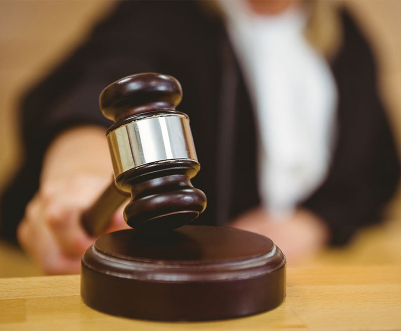 Photo of a judge and a gavel.