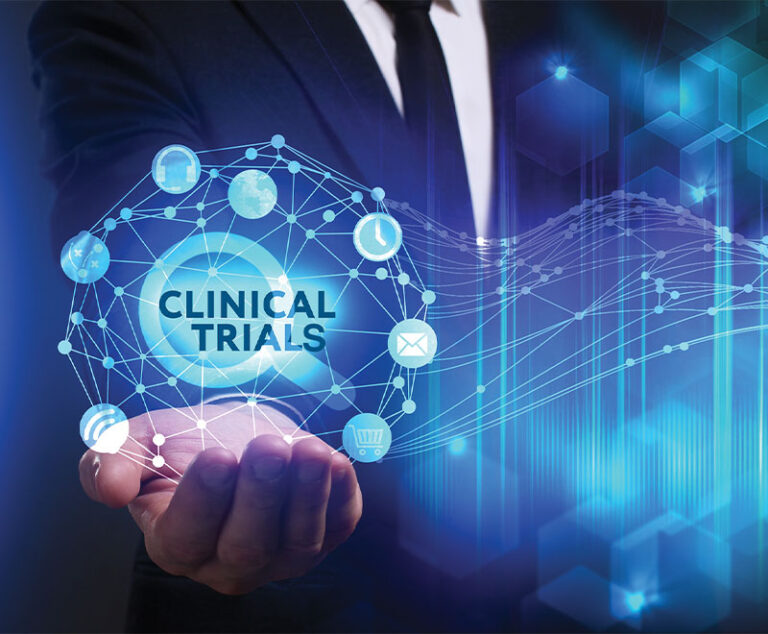 Illustration of a human hand holding text that says clinical trials