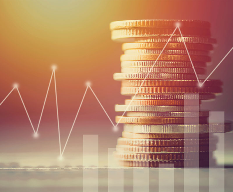 Image of a pile of coins and a graph