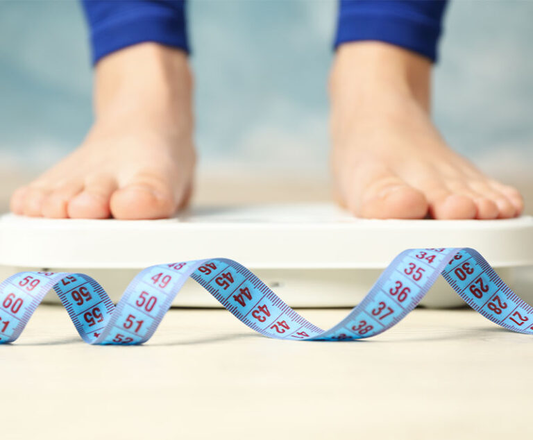 Photo of feet on a scale