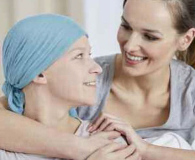 Photo of cancer patient and healthcare worker