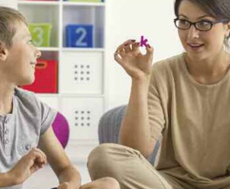 Autistic child with a therapist