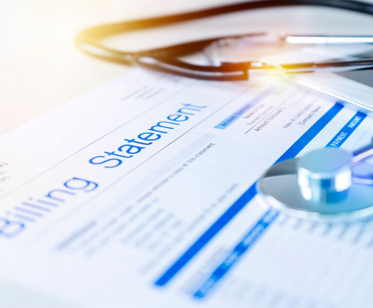 Photo of a hospital bill with a stethoscope