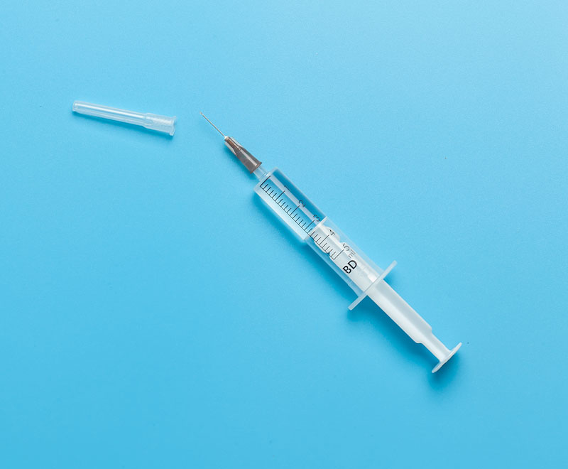photo of a vaccine syringe