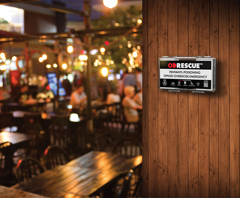 ODRescue kit installed on a wooden wall in a restaurant.