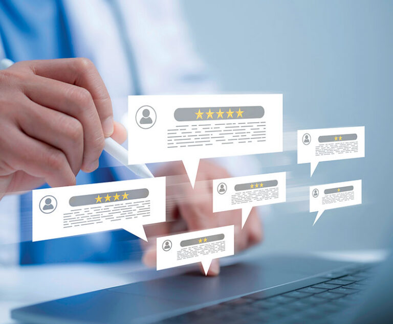 Medical practitioner seeing reviews appearing over a laptop keyboard..